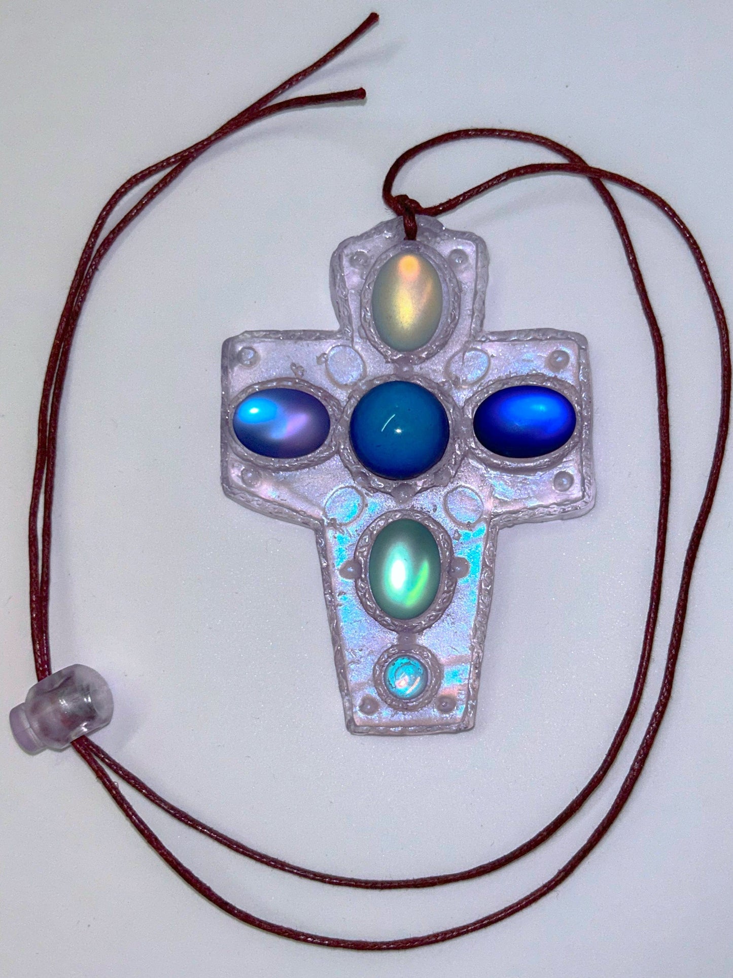 Color Changing Cross on Cord-Emma Pryde-APOC STORE