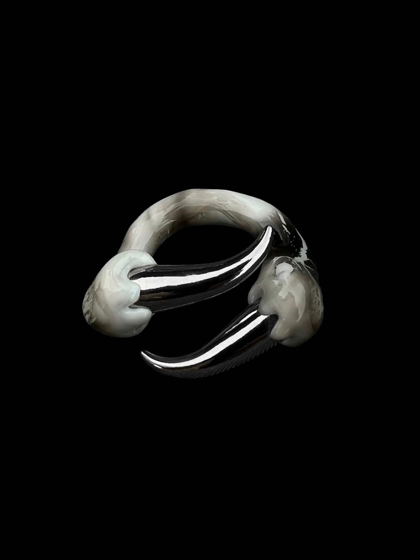 White ring with spikes
