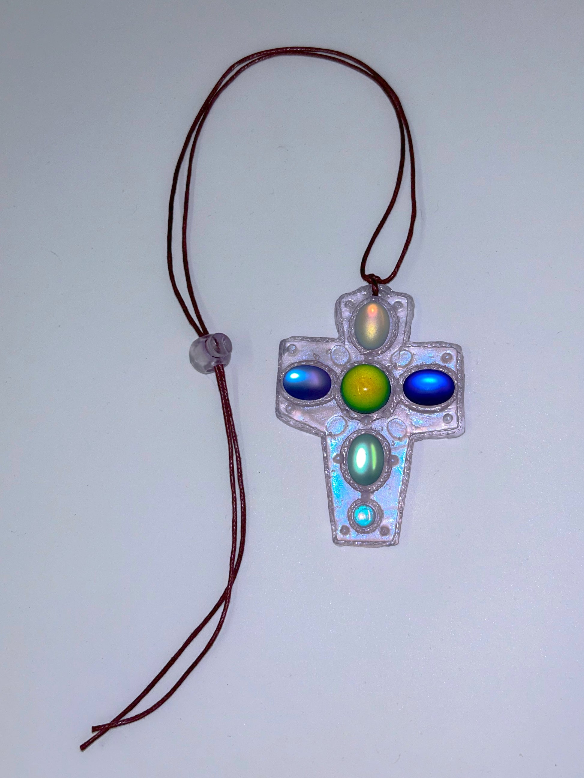 Color Changing Cross on Cord-Emma Pryde-APOC STORE