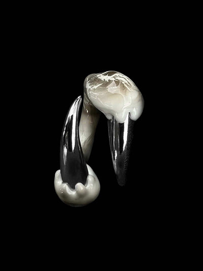 White ring with spikes
