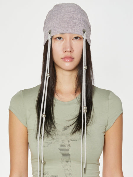 Nibgnus EYELET STRING BEANIE PINK – APOC STORE