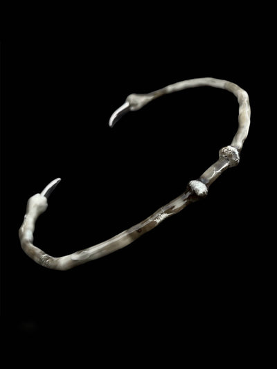 White choker with spikes